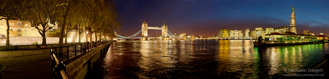 View of the Thames with the Tower of London on the left and the Tower Bridge in the background